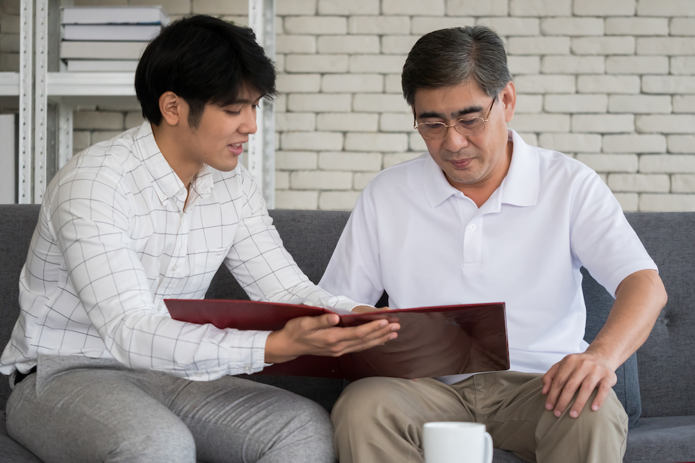 young-man-agent-recommending-life-insurance-to-sen-2021-09-03-16-48-37-utc (1)